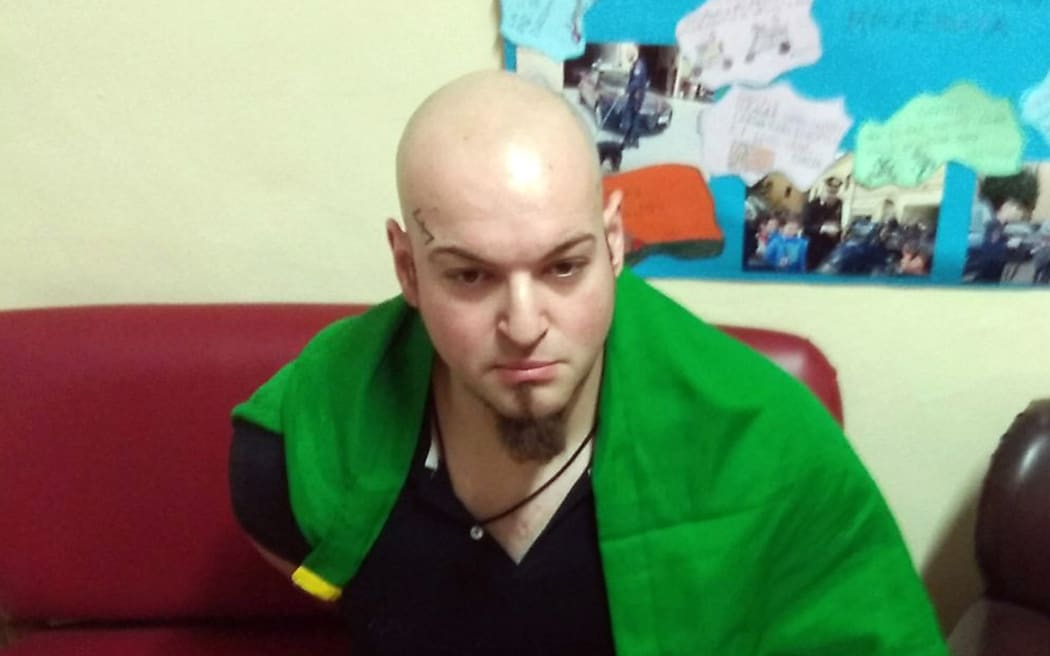 This handout picture released by the Italian Carabinieri Press Office on February 3, 2018 shows an Italian man arrested for suspected of wounding several foreign nationals in a drive-by shooting in Macerata.