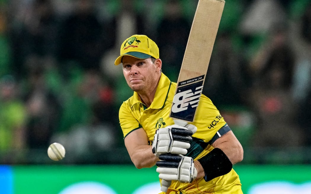 Australia's captain Steve Smith watches the ball after playing a shot during the ICC Champions Trophy.