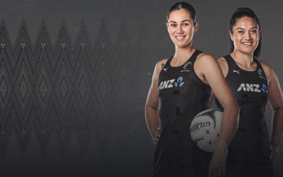 Two netball players in uniform