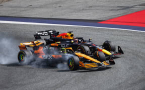 Lando Norris and Max Verstappen battle during the 2024 Austrian Grand Prix.