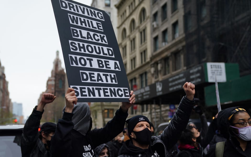Protestors gather in Washington Square Park in New York April 12, 2021 during a protest after the 20yo was fatally shot.