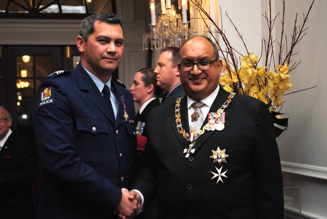 Sergeant Heath Courtenay Jones (left) with then Governor-General Sir Anand Satyanand after receiving the New Zealand Bravery Decoration on 29 June 2011.