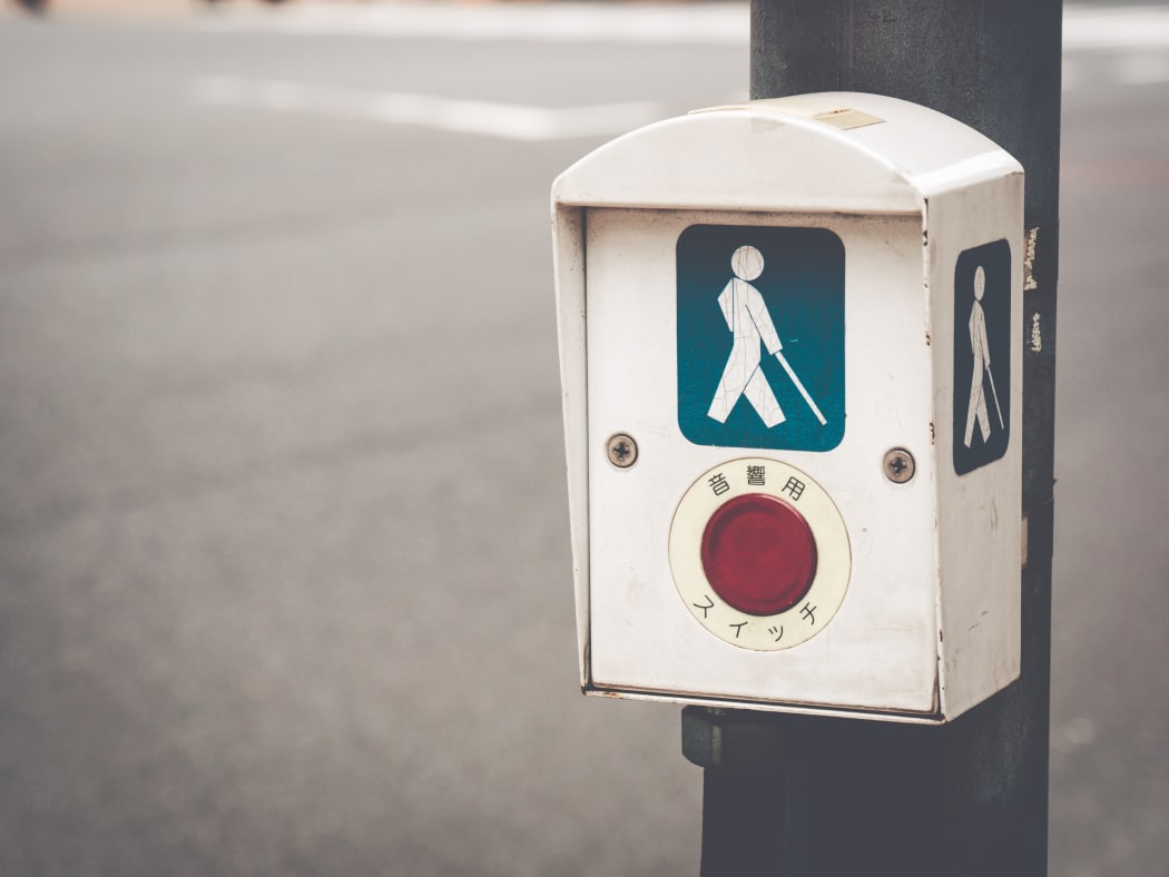 A traffic signal indicator, designed for blind people.