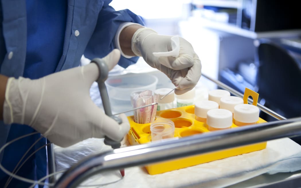 Samples of a colon biopsy to be sent to a laboratory, at Diaconesses Croix Saint-Simon Hospital, Paris, France (2009).