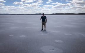 Emirates Team New Zealand Wind Powered Land Speed World Record. Glenn Ashby on Lake Gairdner in South Australia