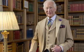 This handout photograph released by Buckingham Palace on January 25, 2025, shows Britain's King Charles III, posing for a photograph in the library at Balmoral, Scotland in Autumn 2024. The King is wearing a kilt made from The King Charles III tartan in a photograph released to mark Burns Night. (Photo by Millie Pilkington / BUCKINGHAM PALACE / AFP) / NO USE AFTER FEBRUARY 8, 2025 12:40:30 GMT - NO USE AFTER FEBRUARY 8, 2025 12:40:30 GMT - XGTY / RESTRICTED TO EDITORIAL USE - MANDATORY CREDIT "AFP PHOTO / MILLIE PILKINGTON / BUCKINGHAM PALACE " - NO SALES - NO MARKETING - NO ADVERTISING CAMPAIGNS - NO DIGITAL ALTERATION ALLOWED  - DISTRIBUTED AS A SERVICE TO CLIENTS - TO BE USED TO ILLUSTRATE THE EVENT MENTIONED IN THE CAPTION - NOT TO BE USED AFTER FEBRUARY 8, 2025 /