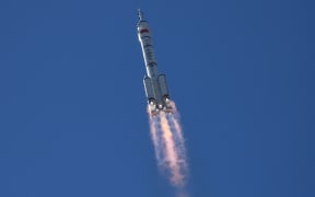 A Long March-2F carrier rocket, carrying the Shenzhou-12 spacecraft and a crew of three, heads to orbit after lifting off from the Jiuquan Satellite Launch Centre in the Gobi desert in northwest China on June 17, 2021,