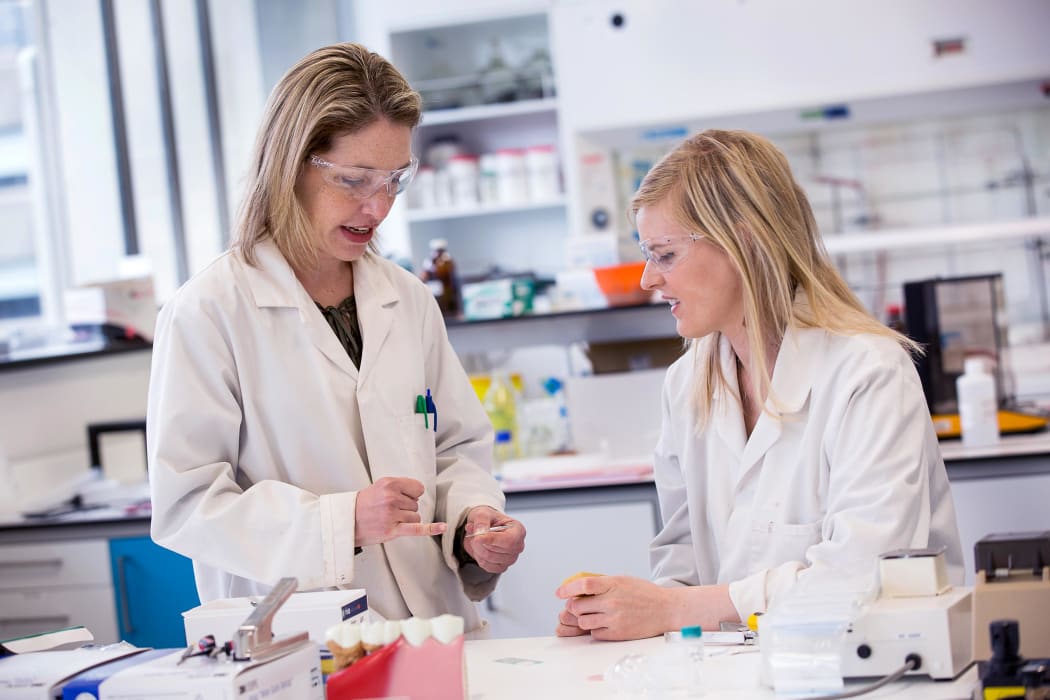 Carla Meledandri (left) with another nanotechnology researcher.