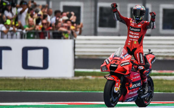 Race winner Ducati Italian rider Francesco Bagnaia celebrates after winning the San Marino MotoGP Grand Prix at the Misano World Circuit Marco-Simoncelli on September 19, 2021 in Misano Adriatico, Italy.