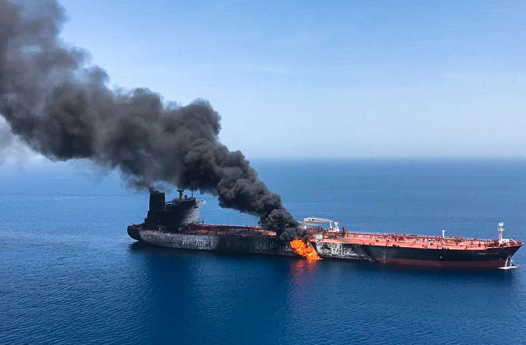 Smoke billows from Norwegian-owned Front Altair tanker in the Gulf of Oman.(Picture obtained by AFP from Iranian News Agency ISNA on 13 June, 2019).
