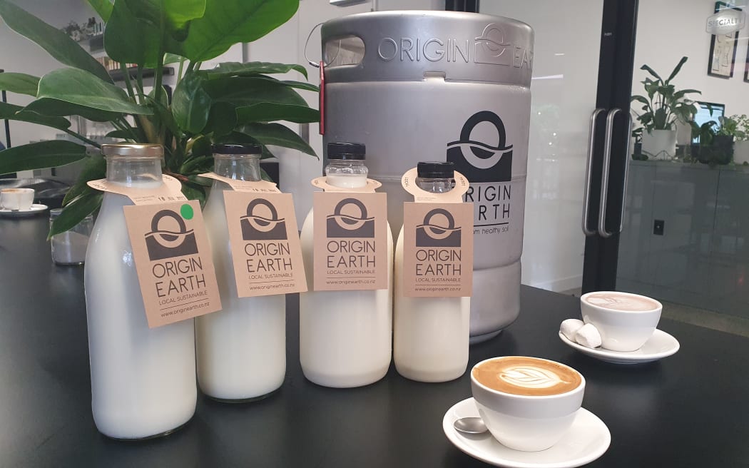 Origin Earth use refillable glass bottles and refillable milk kegs for cafes.