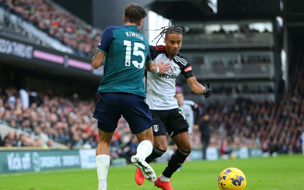 31st December 2023; Craven Cottage, Fulham, London, England; Premier League Football, Fulham versus Arsenal; Bobby De Cordova-Reid of Fulham is defended by Jakub Kiwior of Arsenal.