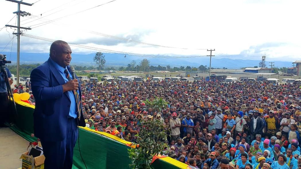 PNG Prime Minister James Marape addresses a large crowd in Tari at an event to mark the surrendering of high-powered weapons by groups under four separate warlords. 8 August, 2021