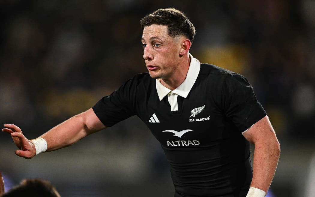 Cam Roigard playing against France.