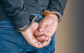 A man in handcuffs