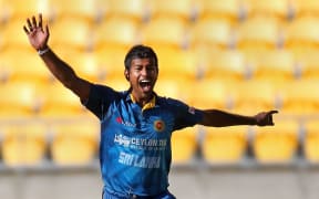 Nuwan Kulasekara celebrates the wicket of Martin Guptill.