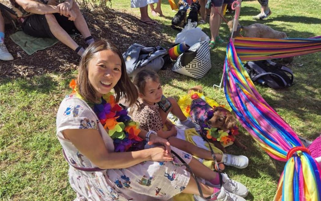 Angie and daughter Stella with their dog Alfie.