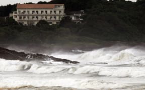 High waves crash into the coast at Hyuga in Miyazaki prefecture, Japan's southern island of Kyushu.