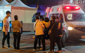 HUALIEN, TAIWAN - APRIL 2: People are seen outside of an hospital where several injured passengers have been shifted to, after passenger train carrying more than 350 passengers derailed with at least 51 dead and dozens injured in Hualien, Taiwan on April 2, 2021.