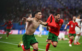 Portugal's forward Francisco Conceicao celebrates with teammates after scoring against the Czech Republic, Euro 2024.