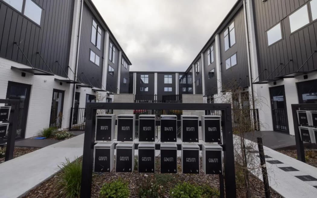 The townhouses feature a commercial space on the bottom floor and two residential floors above.
PETER MEECHAM / THE PRESS