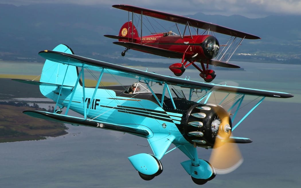 Two Waco biplanes