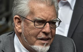Veteran entertainer Rolf Harris arrives at Southwark Crown Court in central London on July 4, 2014.