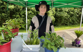 Lydia Starr, Auckland Council senior biosecurity advisor, with pest plants Sagittaria and Houttuynia