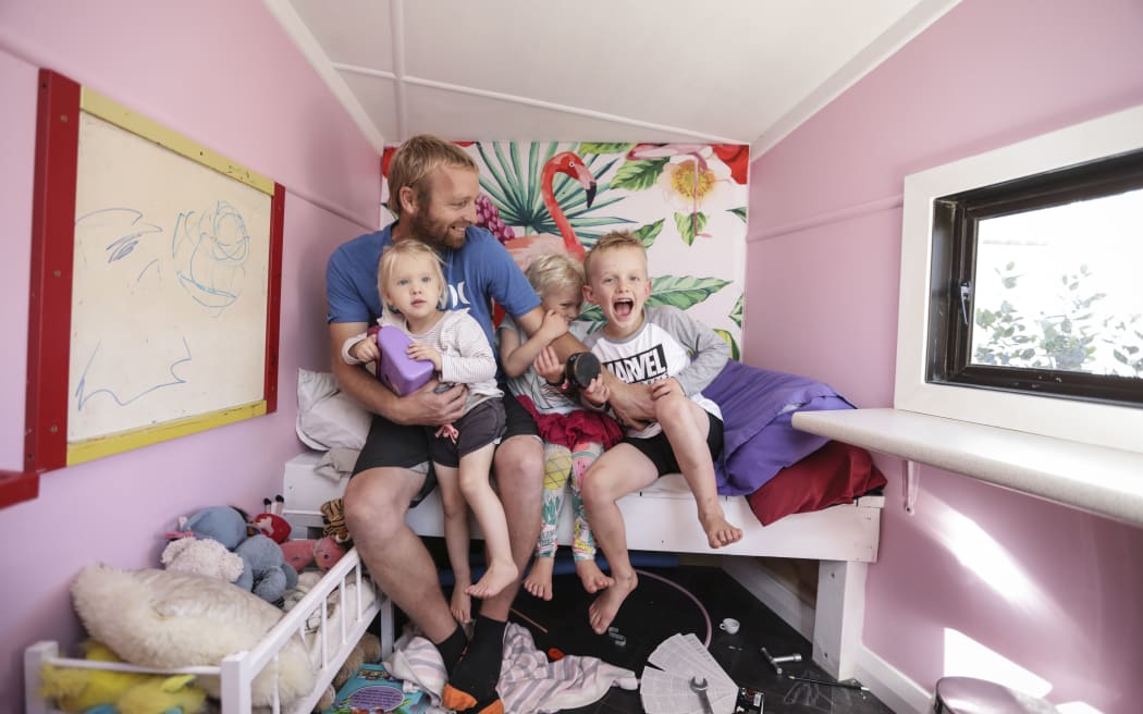 INSIGHT: Stay at home dads: Craig Smith and his children, Paige (2), Charlie (4) and Cobie (6).