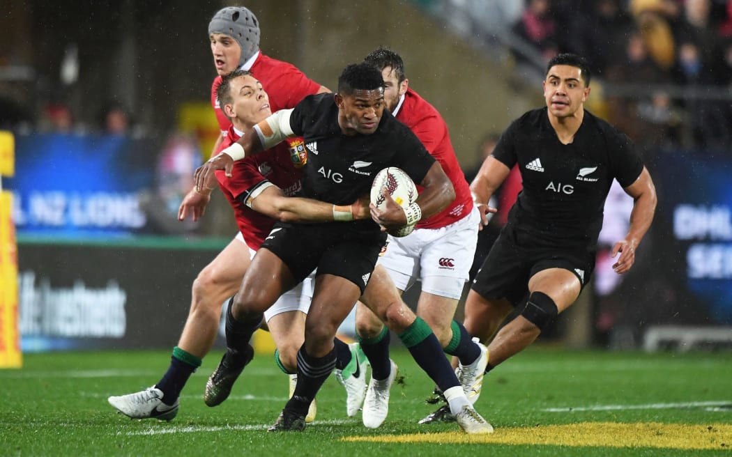 Waisake Naholo makes a break for the All Blacks.