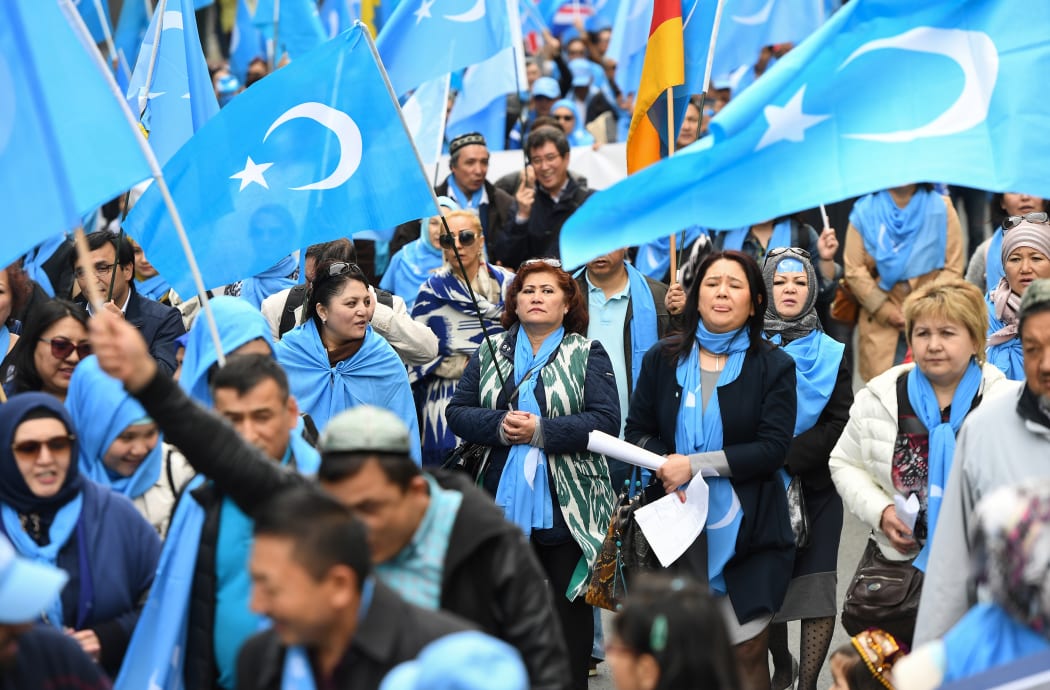 Ethnic Uighurs took part in a protest march in Brussels asking for the EU to call upon China to respect human rights in the Chinese Xinjiang region and asking for the closure of "re-education center" where some Uighurs are detained.