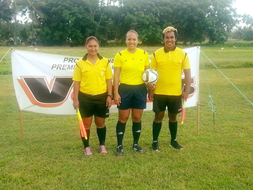 Tupou Patia-Brogan (centre) ahead of officiating a men's A grade match in Rarotonga,