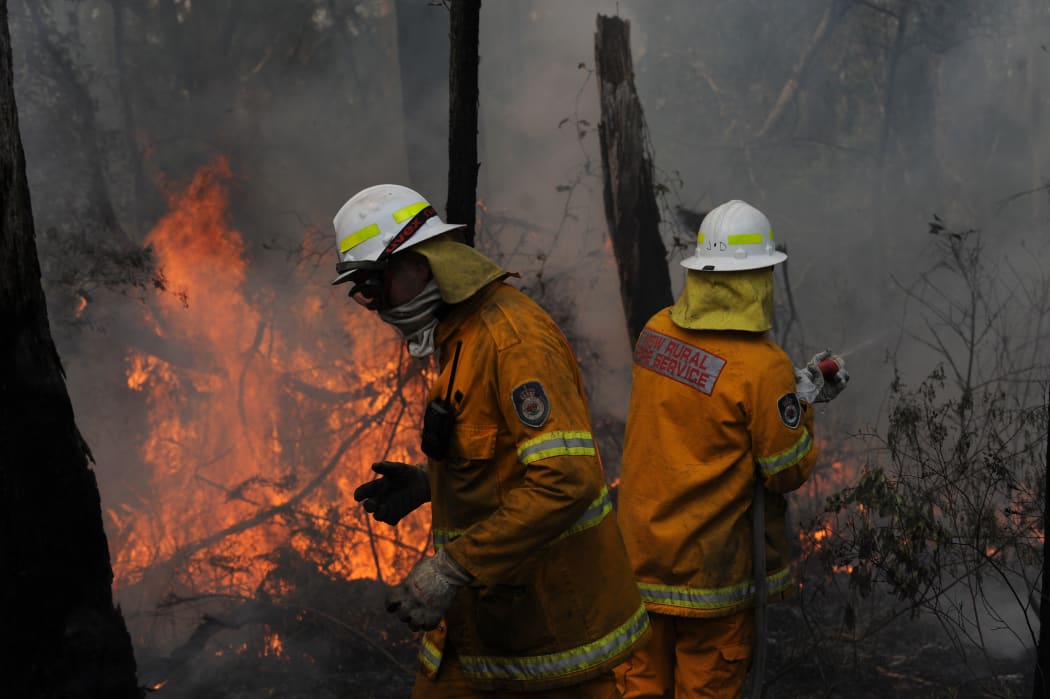 Fire crews protect a property in the Blue Mountains.