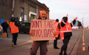 Picketers outside Wellington's Kilbirnie bus depot on Friday morning.