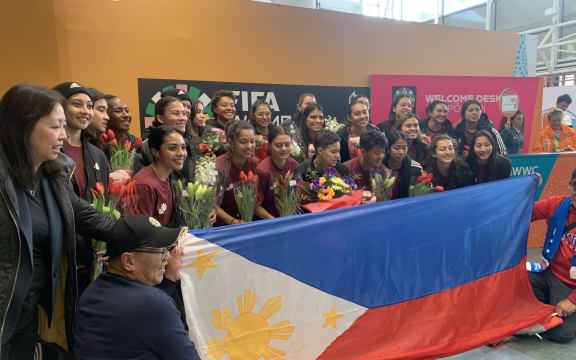 The Phillipines team arrive for FIFA Football World Cup, and take photos with fans.