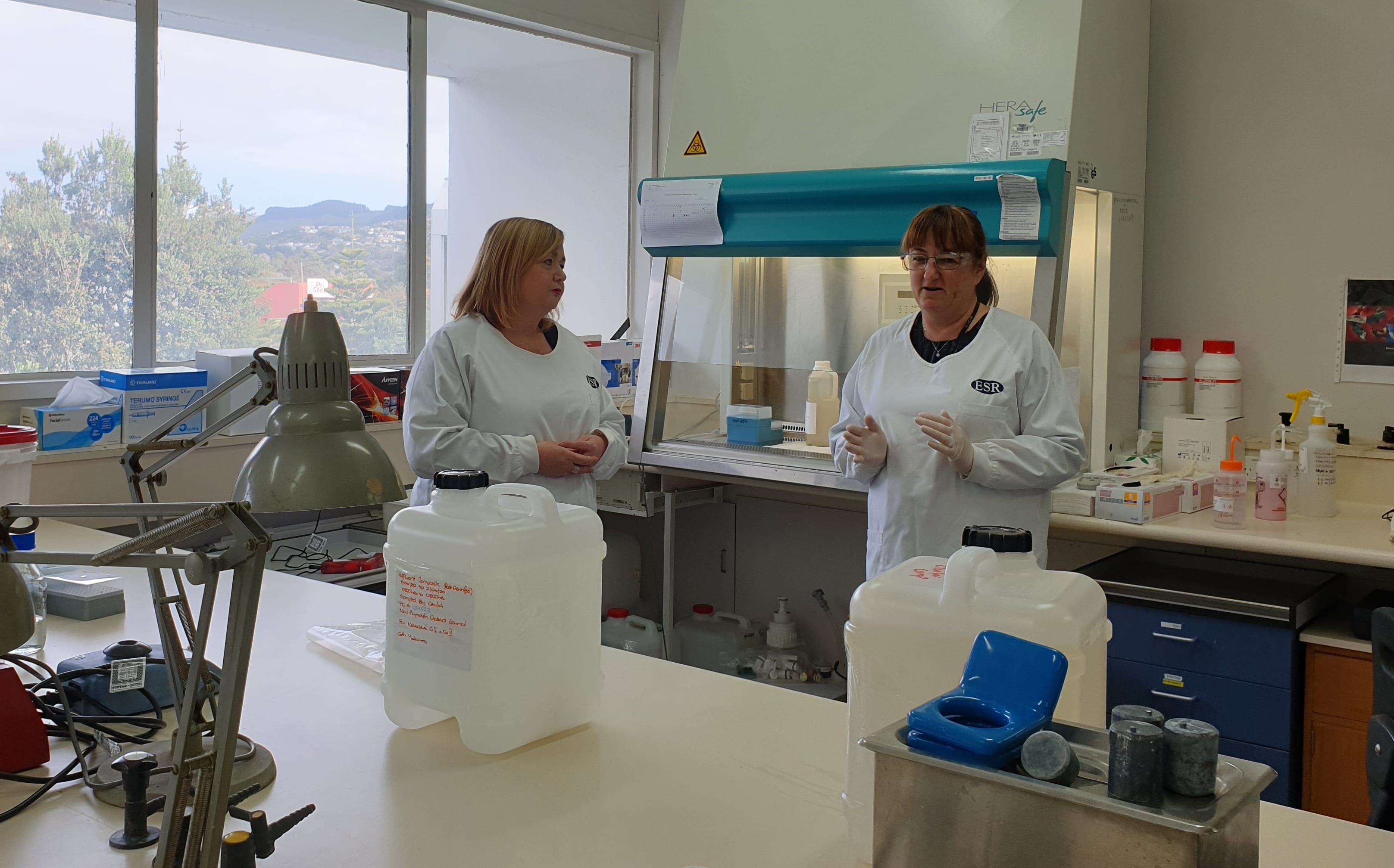 Dr Megan Woods taking a tour around ESR.
