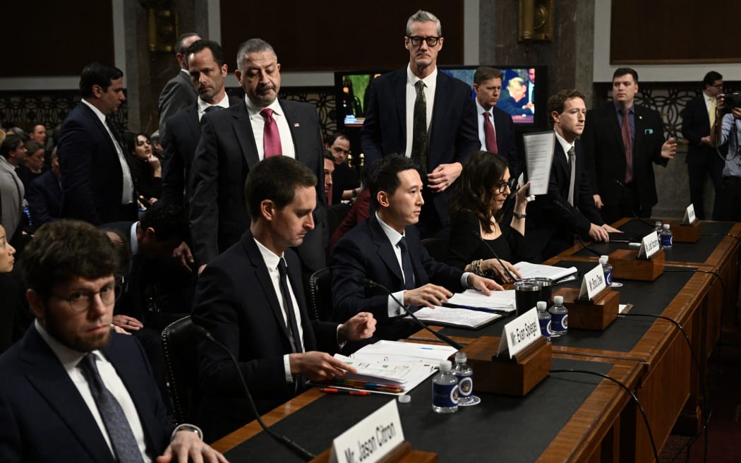 (L-R) Jason Citron, CEO of Discord, Evan Spiegel, CEO of Snap, Shou Zi Chew, CEO of TikTok, Linda Yaccarino, CEO of X, and Mark Zuckerberg, CEO of Meta, attend the US Senate Judiciary Committee hearing "Big Tech and the Online Child Sexual Exploitation Crisis" in Washington, DC, on January 31, 2024. (Photo by Brendan SMIALOWSKI / AFP)