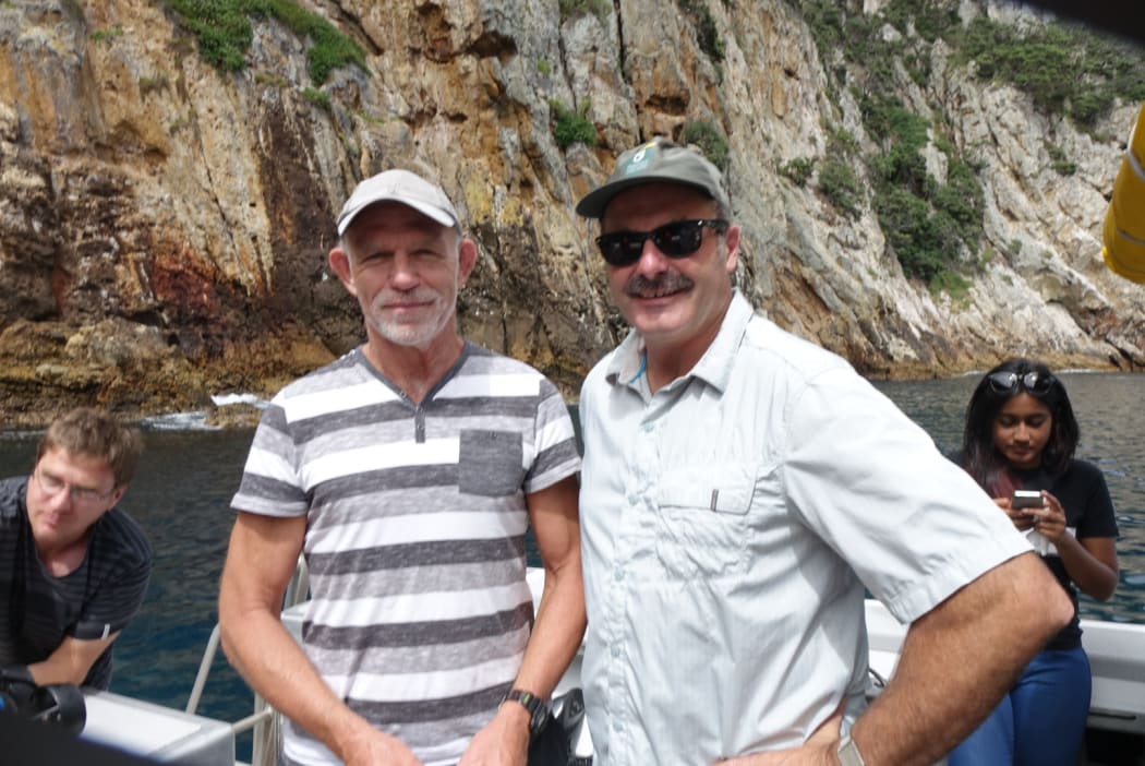 DOC chief science advisor Ken Hughey and DOC director general Lou Sanson at Poor Knights Islands.