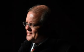 Australia's Prime Minister Scott Morrison awaits the arrival of Papua New Guinea's Prime Minister James Marape for a meeting at Parliament House in Canberra on July 22, 2019. - Marape is on a six-day visit to Australia. (Photo by MICK TSIKAS / POOL / AFP)