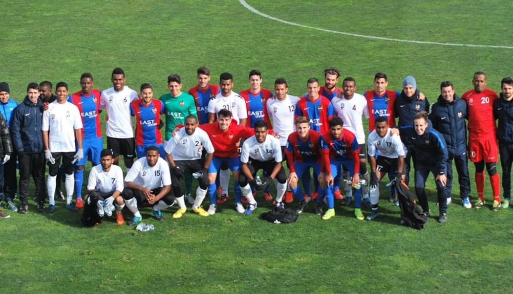 The Fiji and Levante teams pose for a picture after the match.