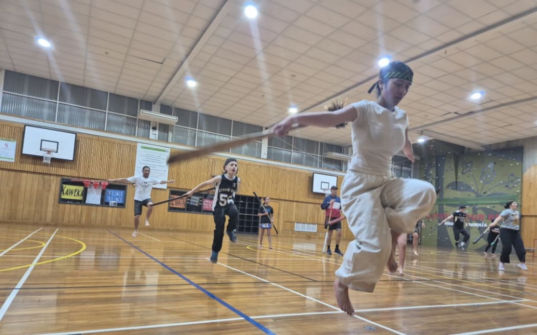 Mau rākau lessons with taiaha at Karamū High School.