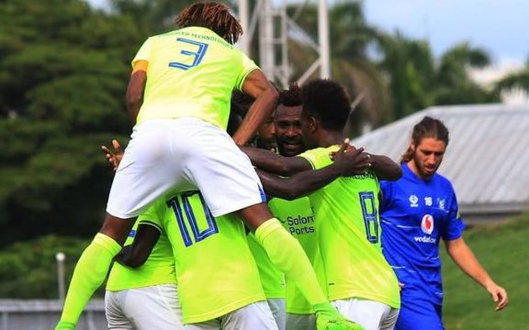 The Henderson Eels celebrate a goal.