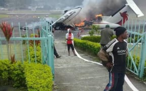 The destroyed Air Nuigini Dash 8 at Mendi Airport