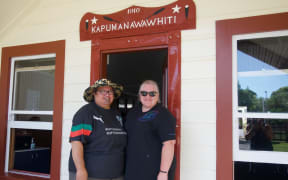 Organisers Mereana Winterburn and Donna-Marie Overend work at the marae to prepare for the tribunal hearing.