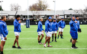 Vaovasamanaia Seilala Mapusua issues instructions during training.