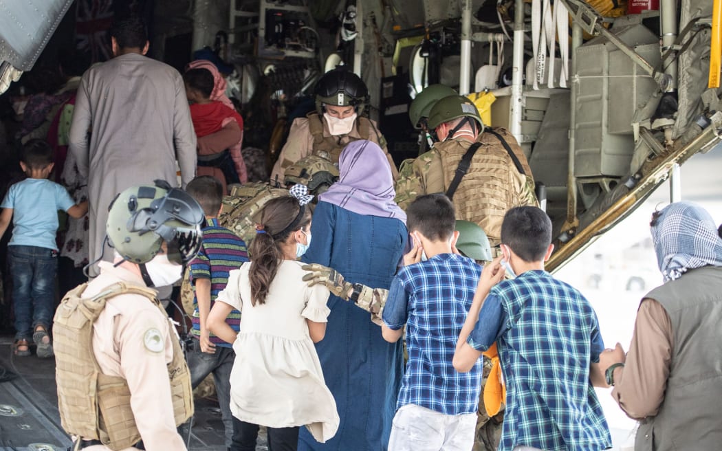 People being evacuated and preparing to leave Afghanistan.