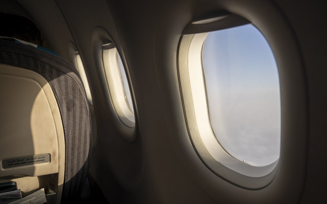 Tunisia, Tunis, 2023-11-07. Aircraft window and low-angled light at dawn entering the cabin. Clouds over the Mediterranean sea seen from a plane flying from Tunis to Lyon. Photograph by Antoine Boureau / Hans Lucas.
Tunisie, Tunis, 2023-11-07. Hublot d un avion et lumiere rasante a l aube entrant dans la cabine. Nuages au dessus de la mediterranee vue depuis un avion reliant Tunis a Lyon. Photographie par Antoine Boureau / Hans Lucas. (Photo by Antoine Boureau / Hans Lucas / Hans Lucas via AFP)