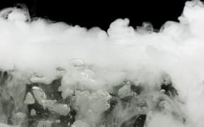 boiling dry ice with vapor, closeup view