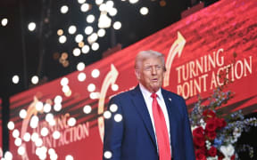 US President Donald Trump arrives to speak at the public memorial service for right-wing activist Charlie Kirk at State Farm Stadium in Glendale, Arizona, on September 21, 2025.