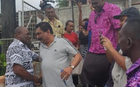 Felix Anthony is greeted by media and his supporters upon his release.